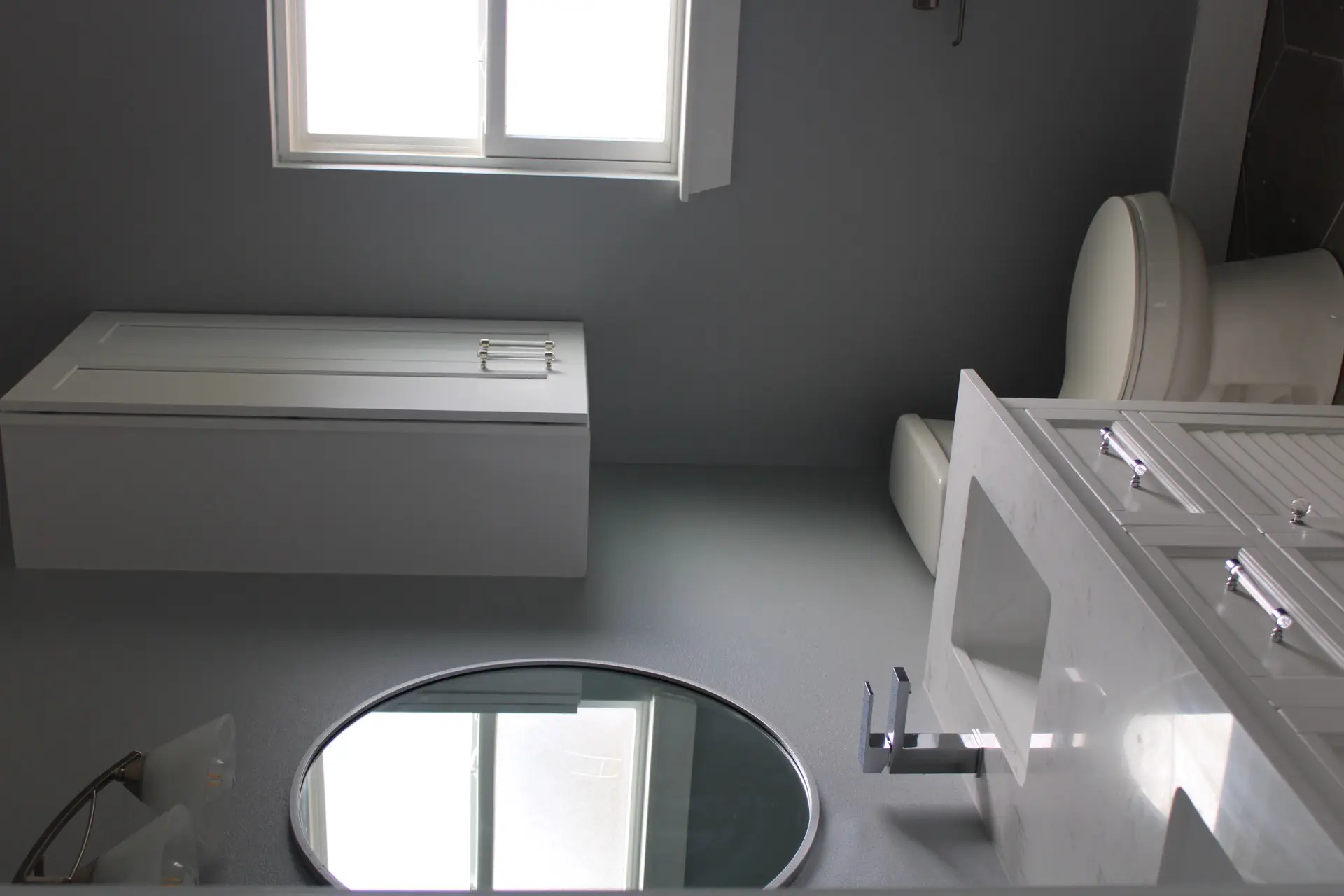 Secondary bathroom featuring a walk-in shower with marble-look tile walls, frameless glass panel, and dark wood-look plank flooring