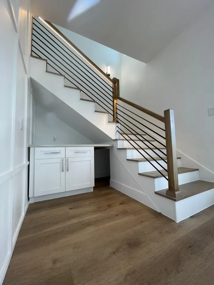 Third bedroom with ensuite bath access, large closet, and abundant natural light from oversized windows on Galveston Island