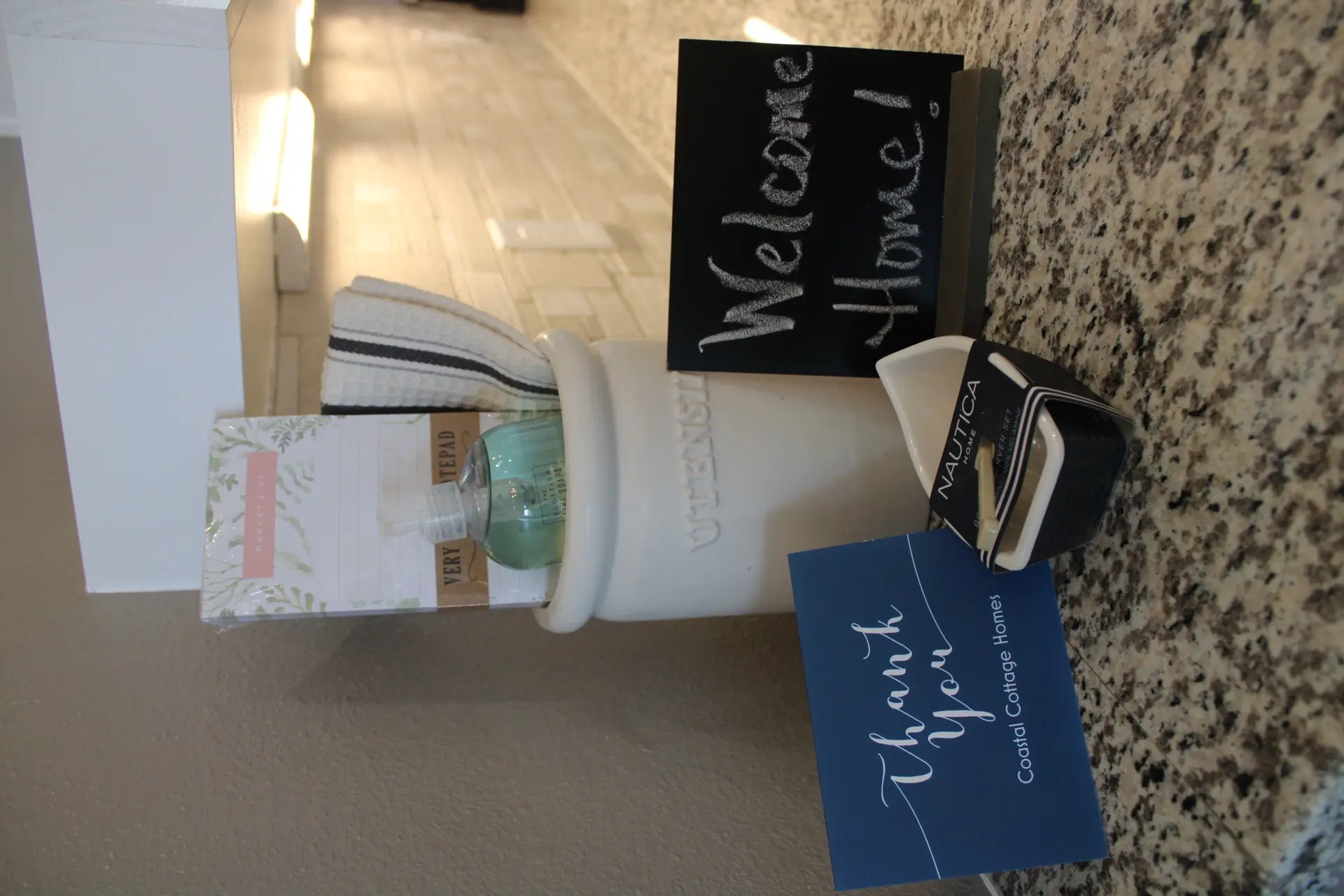 Bedroom closet and storage detail showing built-in shelving and organizational features in the traditional coastal cottage
