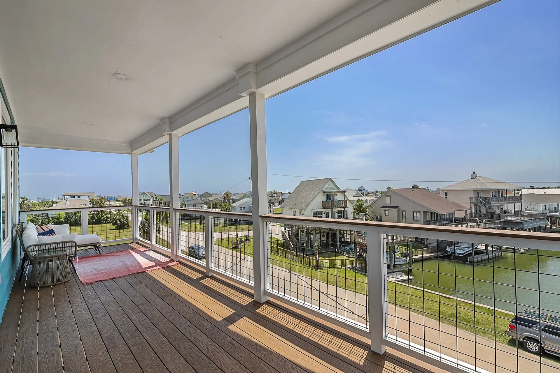 Guest bathroom with white vanity, chrome fixtures, subway tile shower surround, and clean modern coastal finishes
